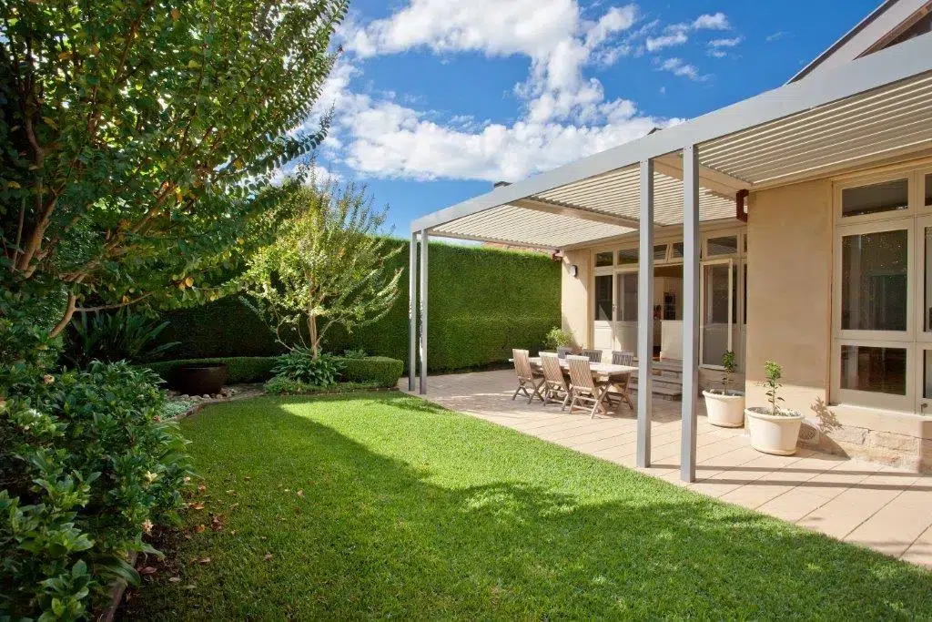 A neat Willoughby backyard with brand new pergola and opening roof.