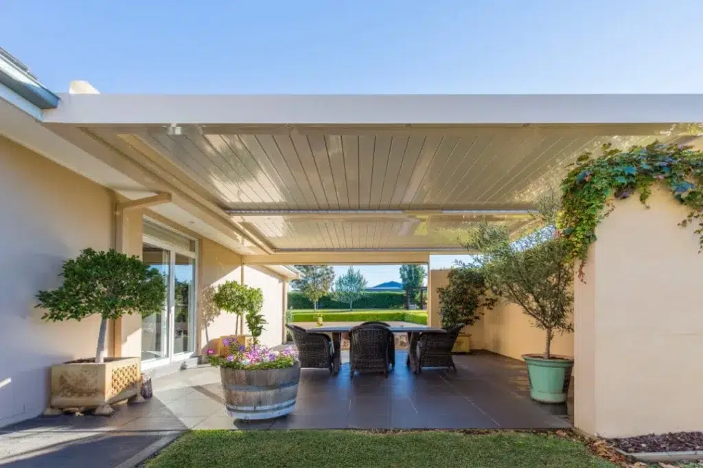 Motorised louvres in the closed position, showing how the pergola is protected from sunlight and rain.