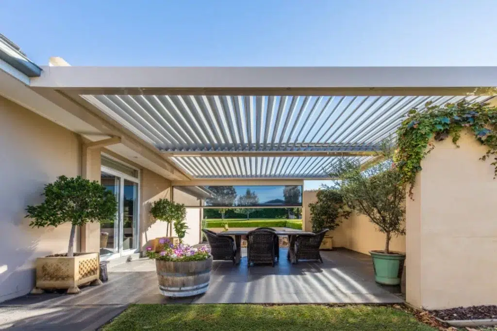 Opening roof louvres on the elegant WIlton pergola outside area.