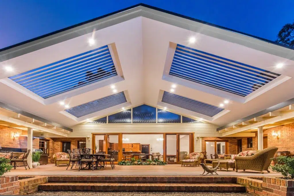 Amazing Windsor Downs pergola with gable roof design and custom integrated roof louvres.