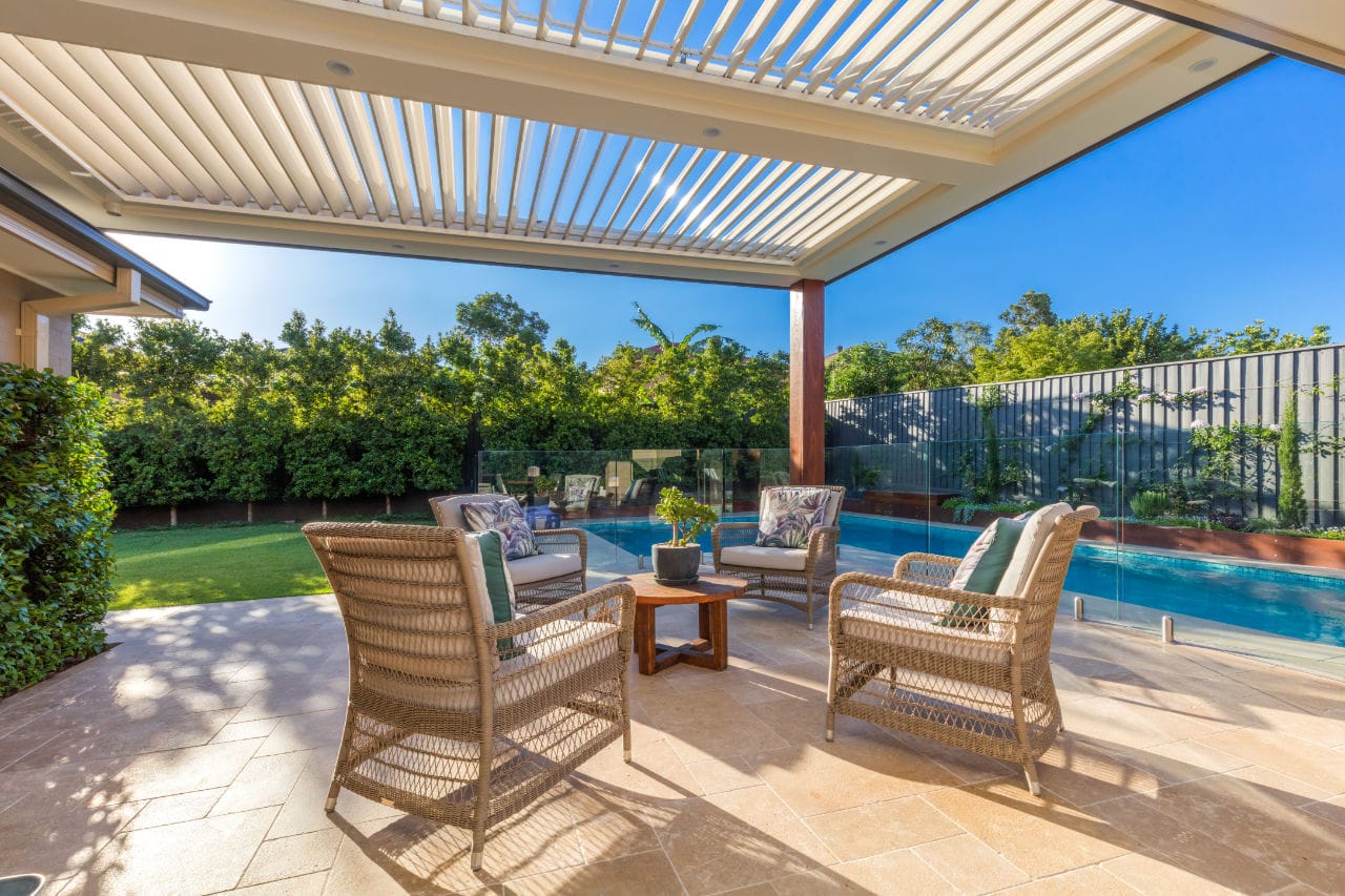 Outside view of Kellyville Ridge pergola with motorised opening roof louvre system.