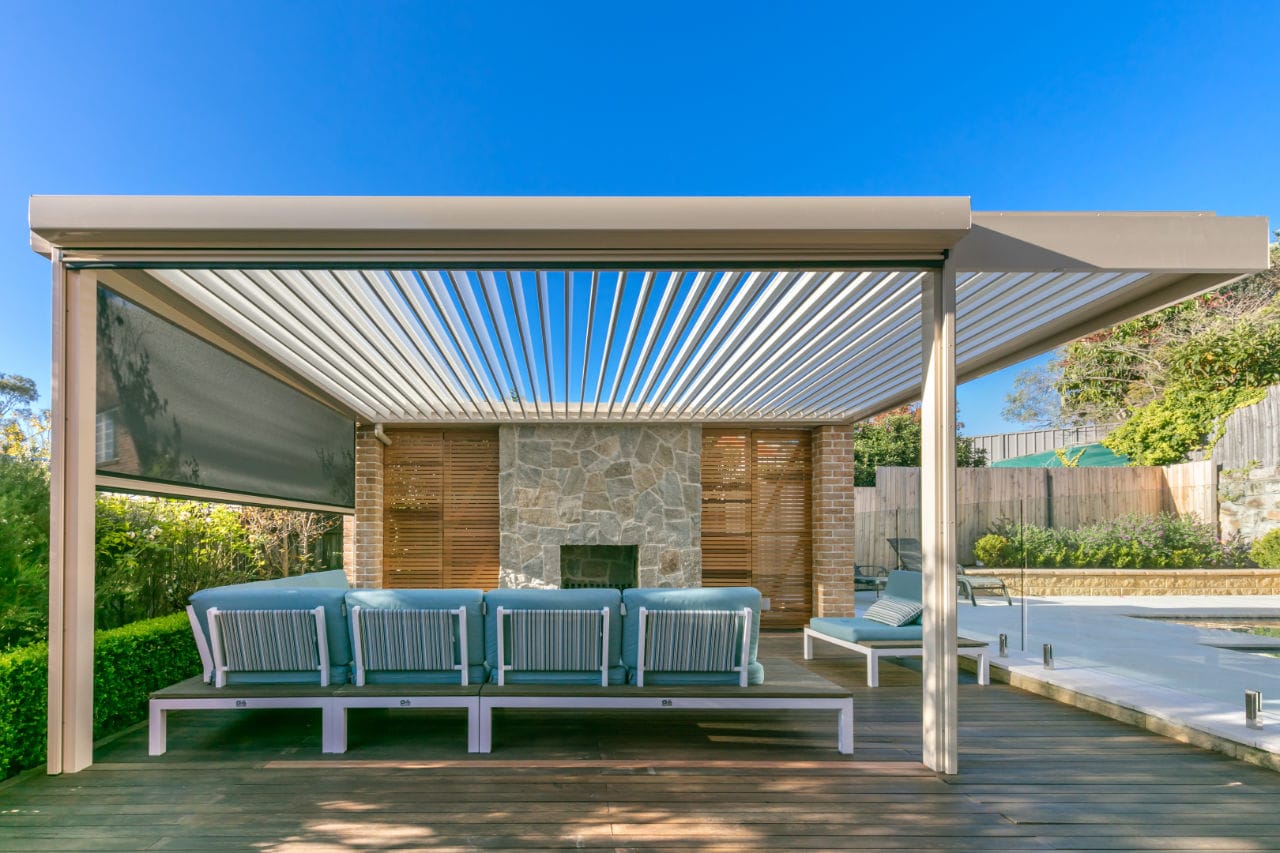 Killarney Heights pergola on a sunny day with the UV blinds at half mast.