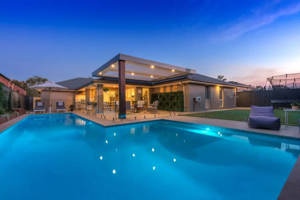 LED downlights shining on the pool in a Kellyville Ridge backyard.