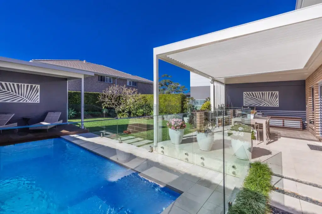 Opening roof pergola by the poolside.