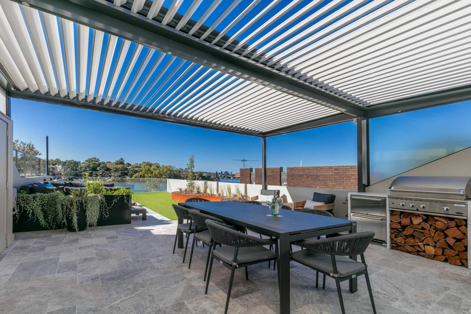 Abbotsford pergola with outdoor dining setting.