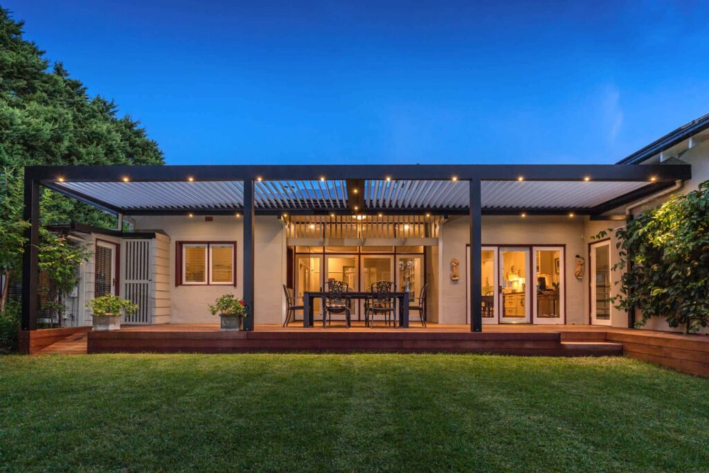 Chatswood pergola with lights turned on.
