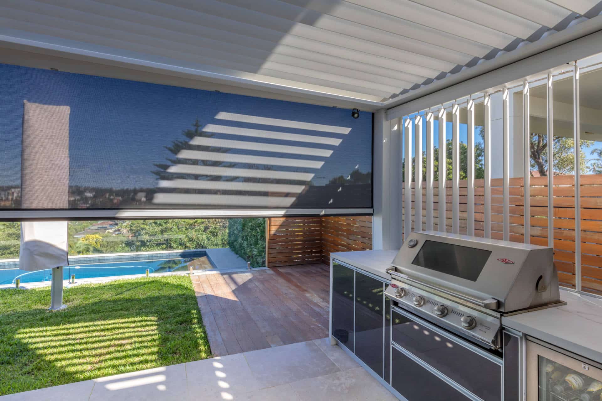UV block outdoor blinds casting a shadow in Manly Vale pergola.