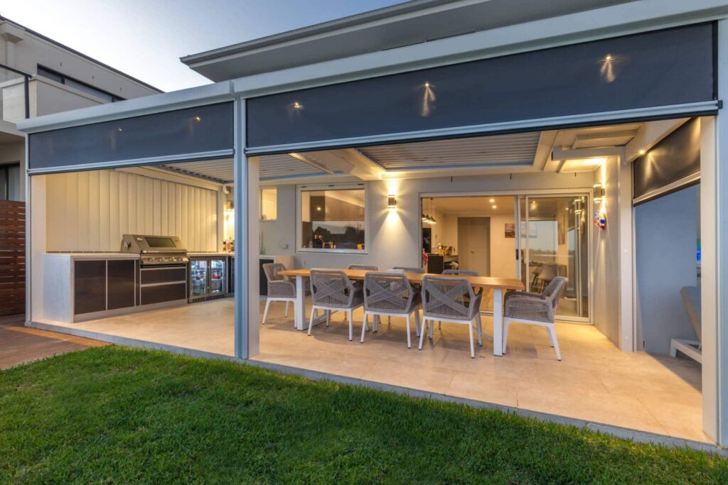 Manly Vale pergola showing outdoor blinds being rolled down.