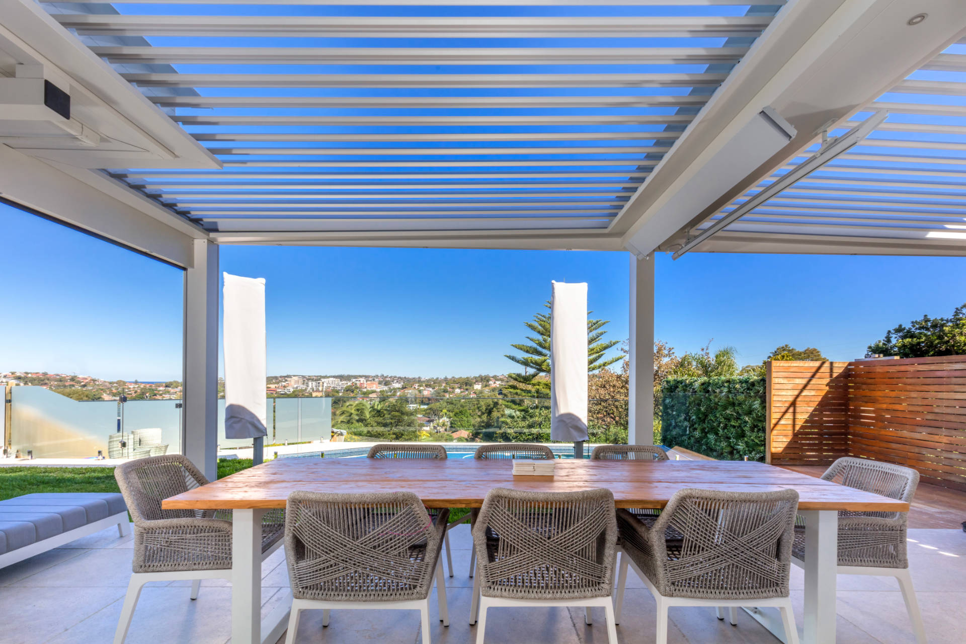 Automatic louvres in Manly Vale pergola dining area.