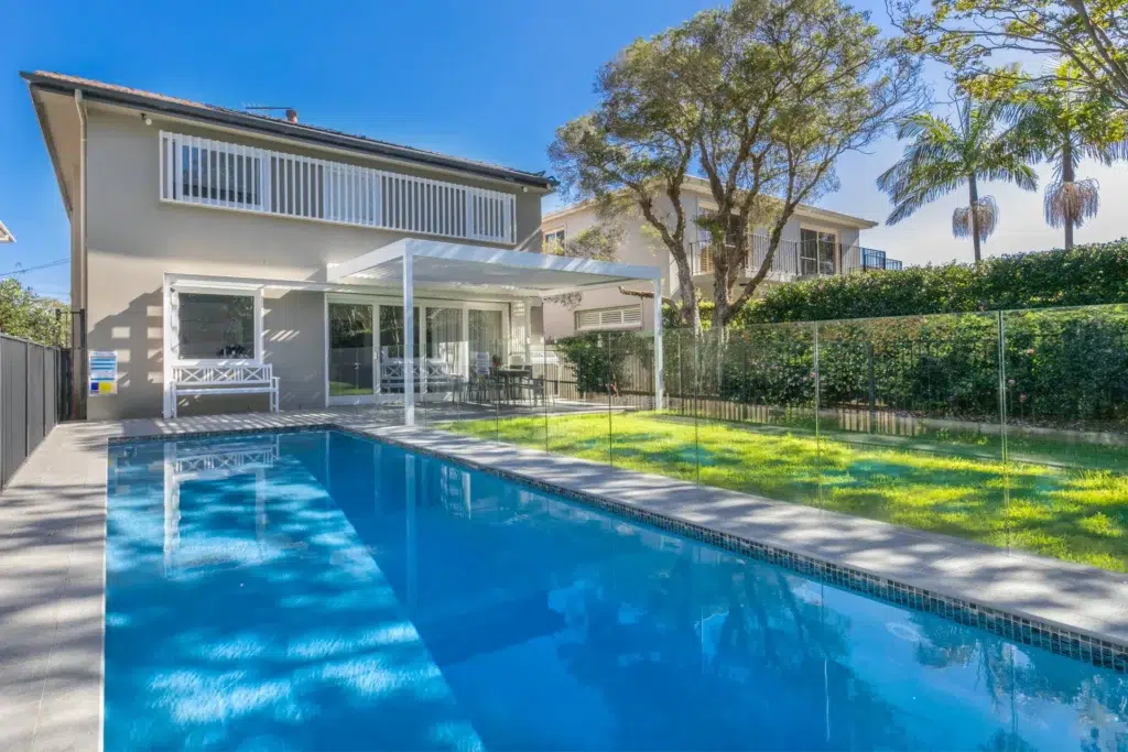Riverview pergola from across the pool.