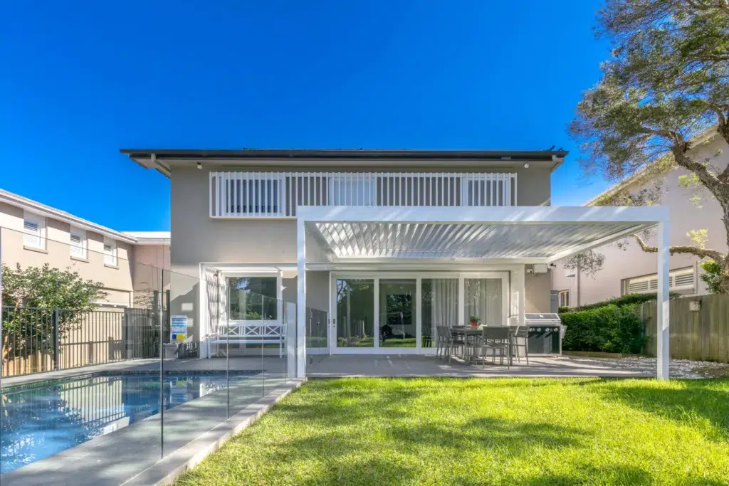 Riverview pergola front view next to the pool
