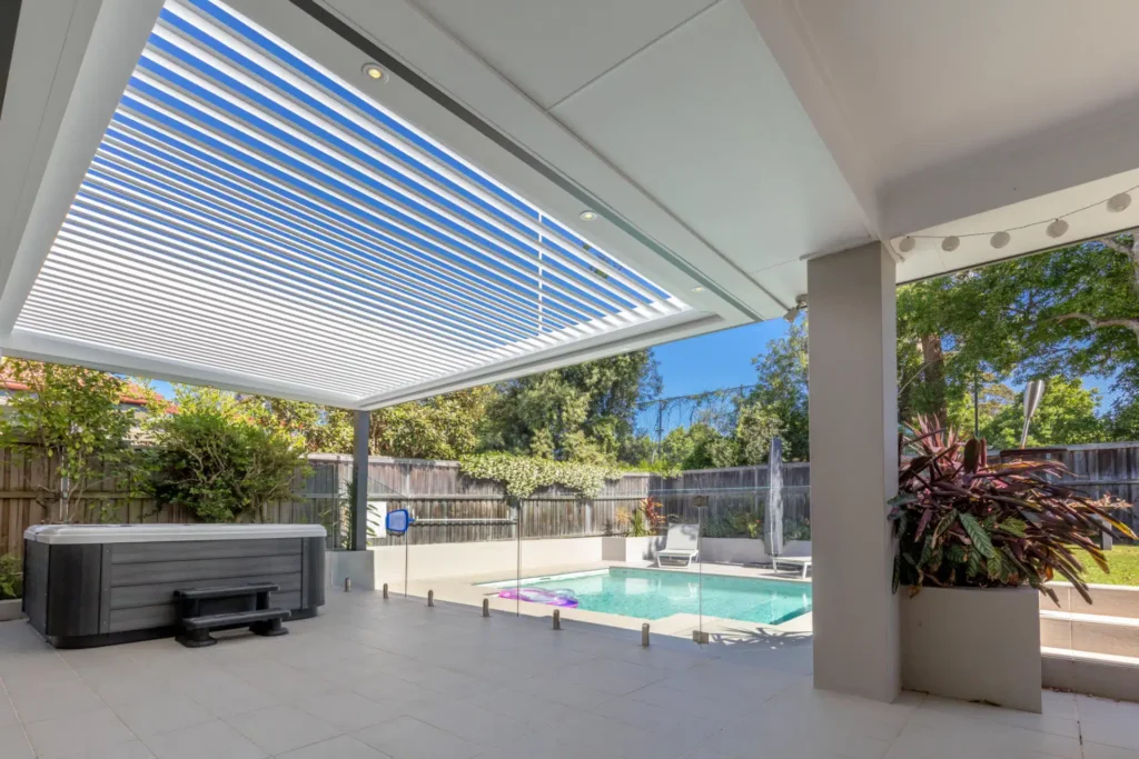 Opened louvres on Lane Cove pergola by the pool.