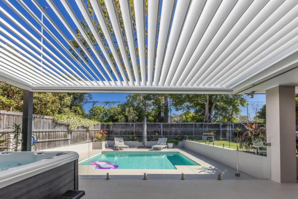 Opened louvres on Lane Cove pergola by the pool.