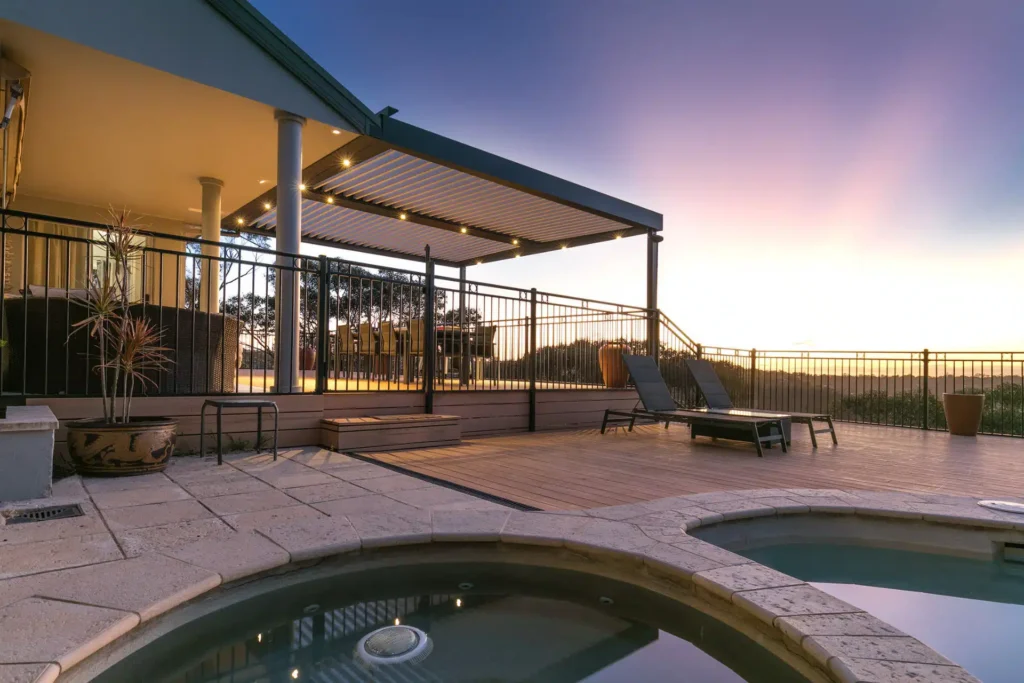 Photo of a Beacon Hill home with a new opening roof pergola at sunset