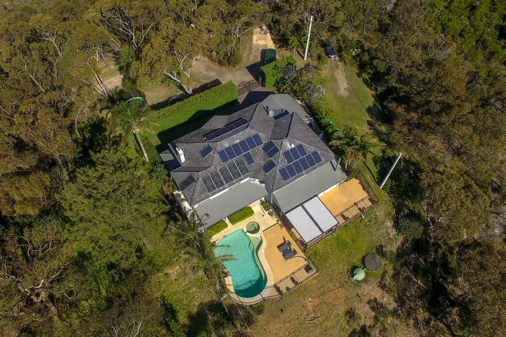 Far aerial photo Beacon Hill home with a new opening roof pergola