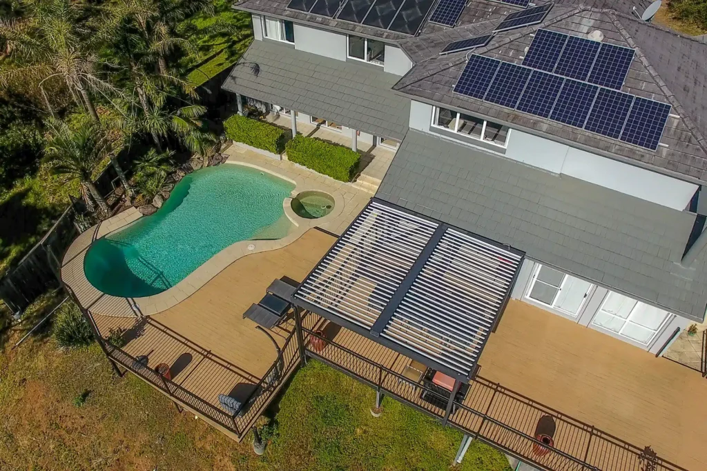 Aerial photo of a Beacon Hill home with a new opening roof pergola and solar panels