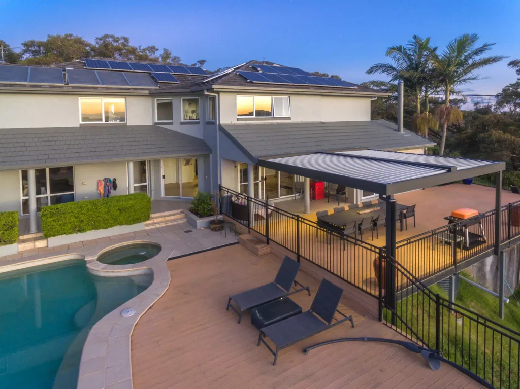 Aerial photo of a Beacon Hill home with a new opening roof pergola overlooking the pool