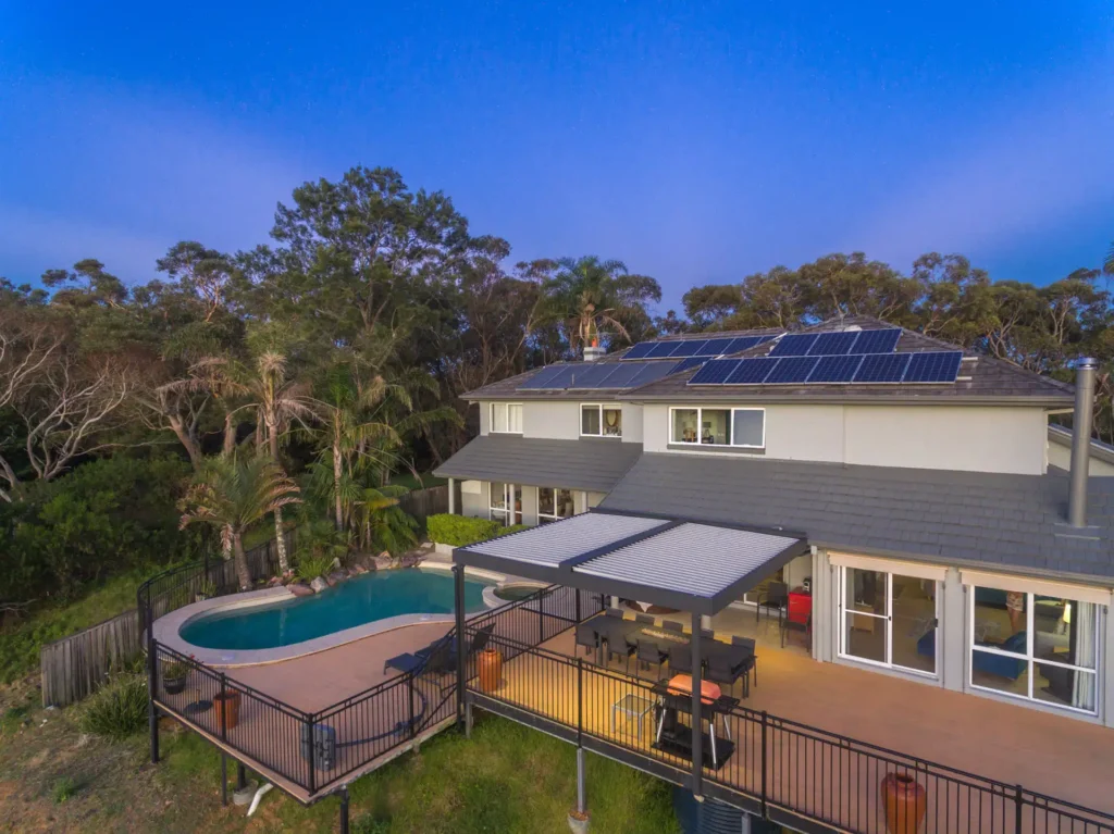 Photo of a Beacon Hill home with a new opening roof pergola with LED lights