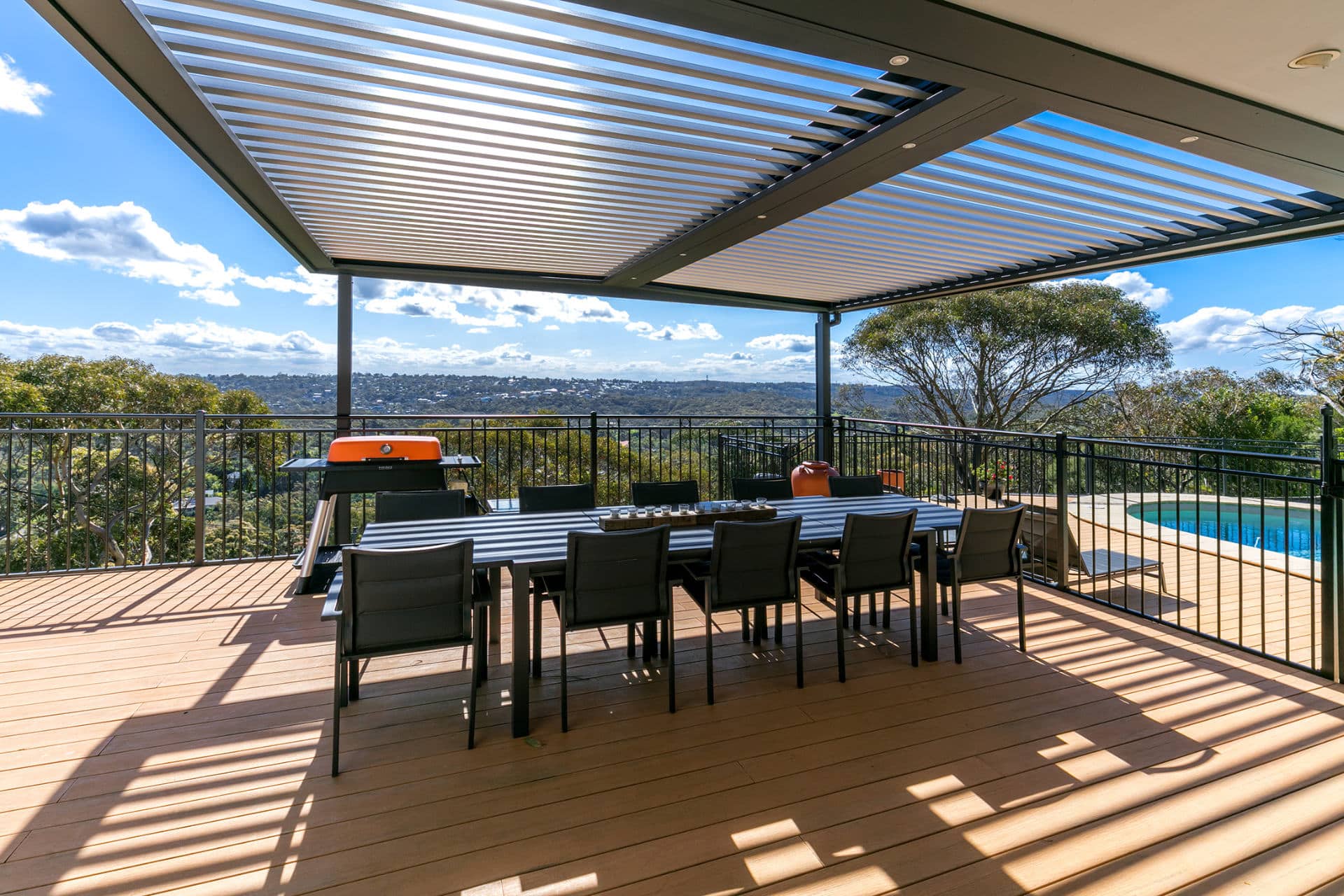 A Beacon Hill home with a new opening roof pergola showing a stunning view