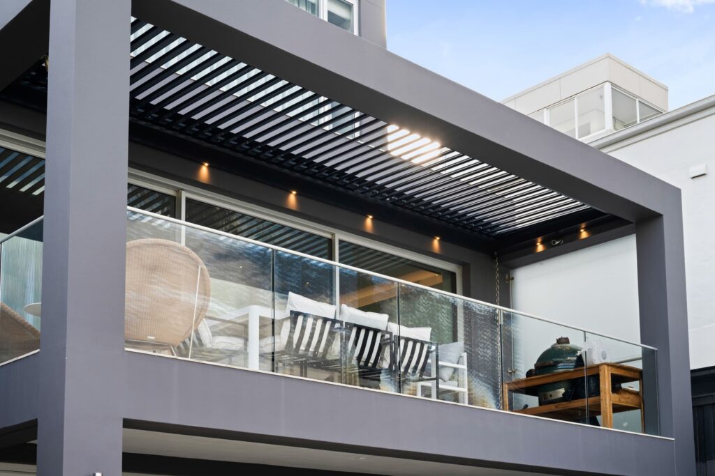 Clovelly balcony louvre roof in Zeus Grey close up from the front.