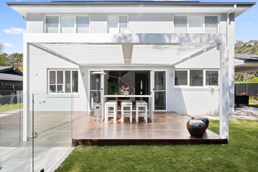 Pearl White louvre roof over St Ives poolside decking.