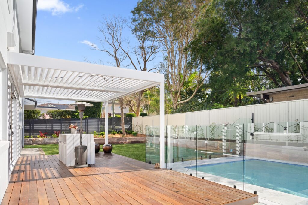 Corner aspect of white louvre roof.