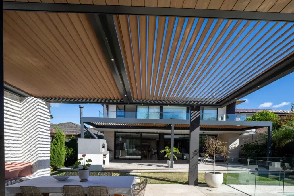 View of the house from underneath the poolside opening roof system.
